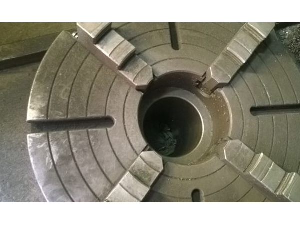 四爪卡盘如何找正，（四爪卡盘找正的简便方法）